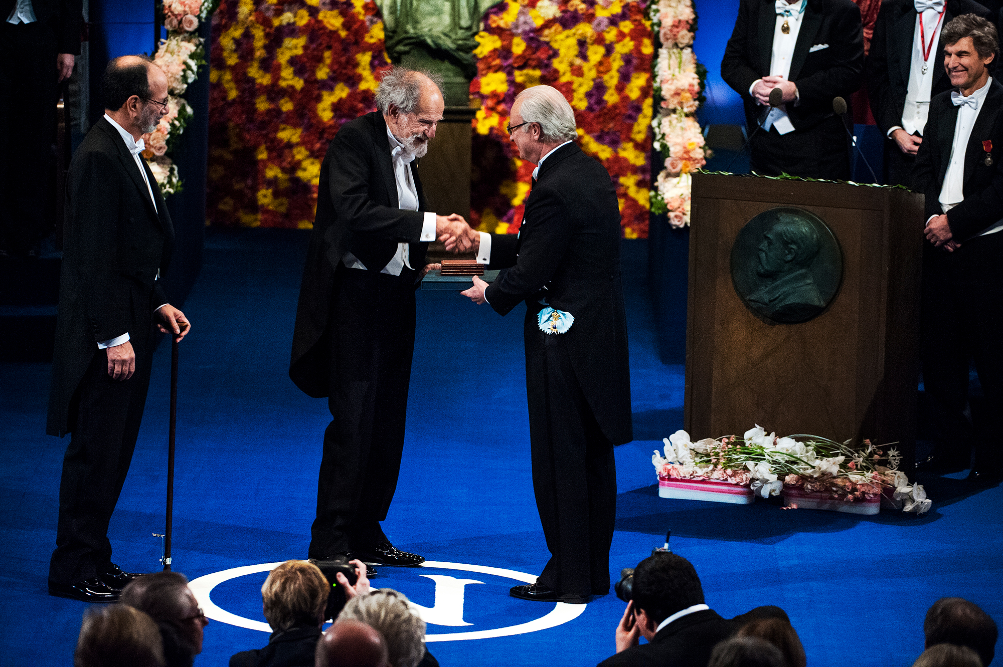 Lloyd Shapley, UCLA professor emeritus of economics and mathematics, is on stage accepting Nobel Memorial Prize. 